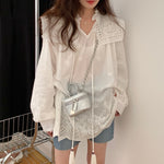 White Eyelet Blouse with Embroidery and Tussles