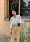 White Ruffled V Neck Blouse