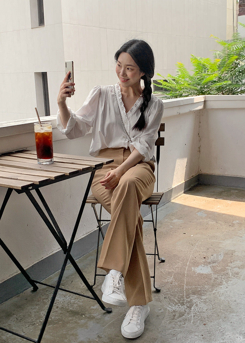 White Ruffled V Neck Blouse