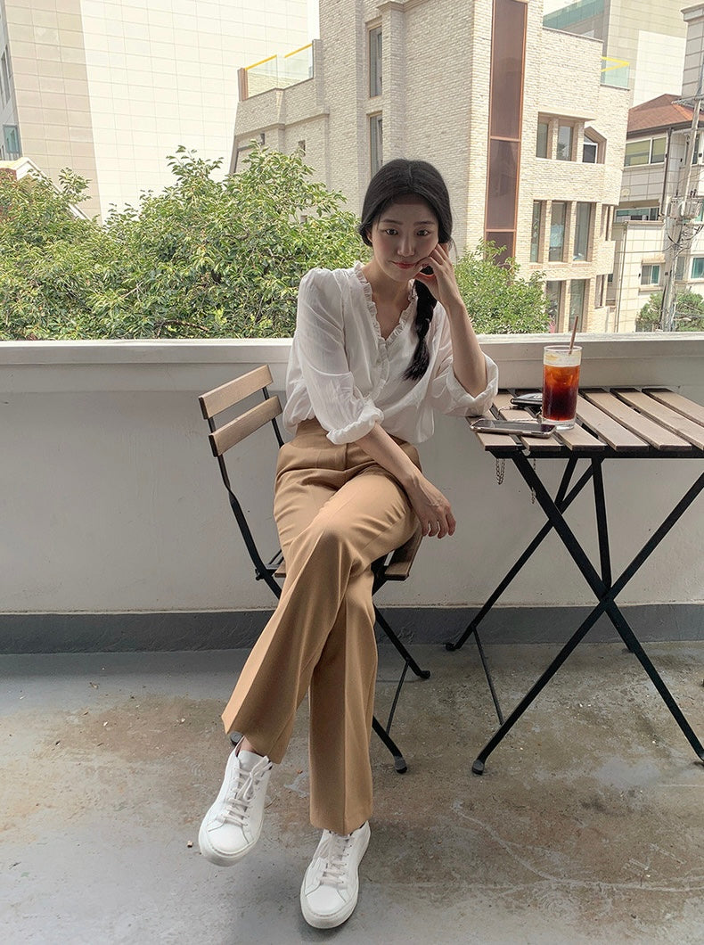 White Ruffled V Neck Blouse