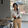 White Ruffled V Neck Blouse