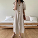 Designer Minimalist V-Neck Maxi Dress with Geometric Buttons