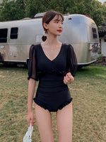 Sweet & Sexy Ruffled Swimsuit with Meshed Sleeves