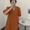 Minimalist Pumpkin-Colored Puffed Sleeve V-Neck Cotton Mini Dress