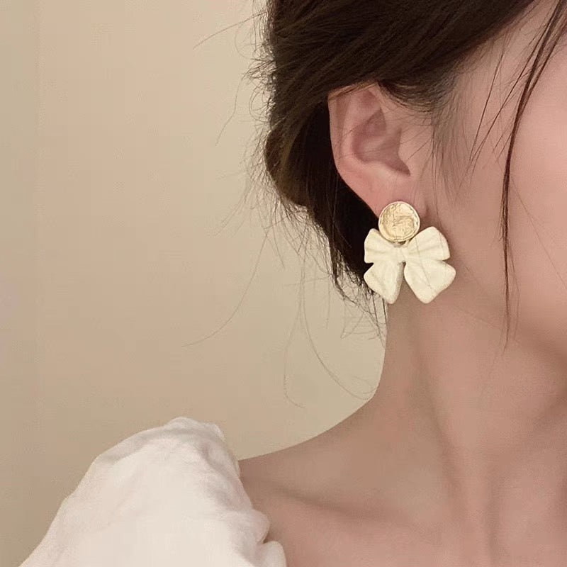 Dangling Bowknot Designer Earrings