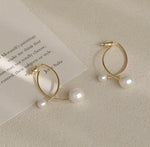 Double Pearly Cross Over Fishtail Earrings