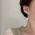 Double Pearly Cross Over Fishtail Earrings