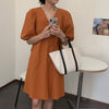 Minimalist Pumpkin-Colored Puffed Sleeve V-Neck Cotton Mini Dress