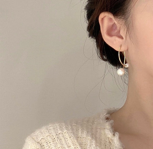 Double Pearly Cross Over Fishtail Earrings
