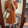 Minimalist Pumpkin-Colored Puffed Sleeve V-Neck Cotton Mini Dress